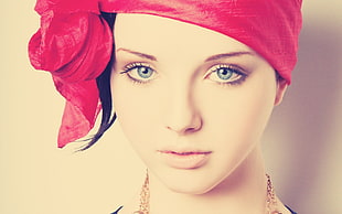 woman wearing red head scarf